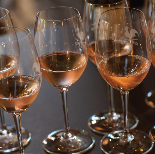 Wine glasses on a table at The Kitchen at Middleground Farms